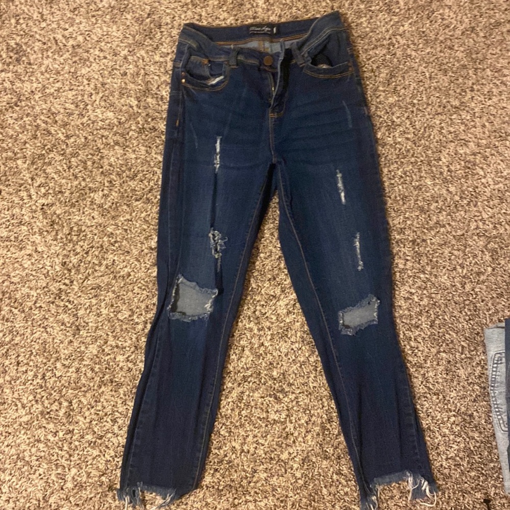 Slimmer fit jeans with cute distressing. Very stretchy and comfortable.